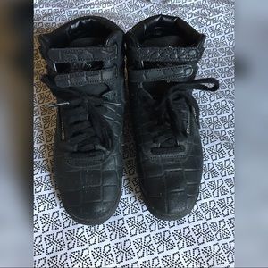 Woman’s limited edition hightop Reebok classics